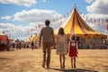 Family walking in front of a colorful circus tent