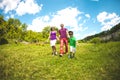 Family walking in a meadow Royalty Free Stock Photo