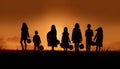 Family walking in nature at dusk, silhouettes back lit by sunset generated by AI Royalty Free Stock Photo