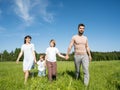 Family walk outdoors holding hands Royalty Free Stock Photo