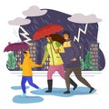 Family walking in the rain with umbrella, running through the puddles, lightning in the sky Royalty Free Stock Photo