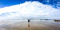 Family walking on sandy beach in Portugal Atlantic coast