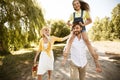 Family Walking Spending Time Together Going On Picnic In Countryside Royalty Free Stock Photo