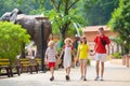 Family walking in summer park. Group of kids walk Royalty Free Stock Photo