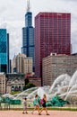 A family is walking together around Buckingham Fountain in downtown Chicago Royalty Free Stock Photo