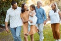 Family, walking and together in park with love and spending quality time outdoor, for bonding and care. Grandparents Royalty Free Stock Photo