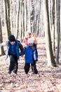 Family walking in the woods