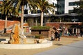 A family walks their dog in Jack London Square,