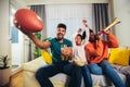 Family watching american football match on television Royalty Free Stock Photo