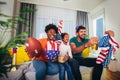 Family watching american football match on television Royalty Free Stock Photo