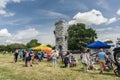 Family watching children scaling up the climbing wall Royalty Free Stock Photo