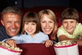 Family Watching Film In Cinema Royalty Free Stock Photo