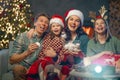 Family watching holiday movies at home Royalty Free Stock Photo