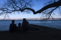 Family watching lake landscape