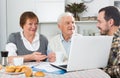 Family watching news in Inet Royalty Free Stock Photo