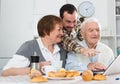 Family watching news in Inet Royalty Free Stock Photo