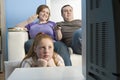 Family Watching Television Together Royalty Free Stock Photo