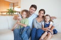 Family watching TV together Royalty Free Stock Photo