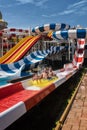 Happy family in water splash after water slide Royalty Free Stock Photo