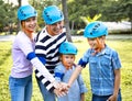 Family wearing protective blue helmets