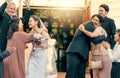 Family, wedding at church for the bride and groom hugging in celebration and happiness for marriage ceremony farewell Royalty Free Stock Photo