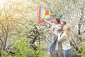 Family Welcoming Husband Home On Army Leave. Royalty Free Stock Photo