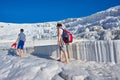 Family in white calcium Pamukkale travertines