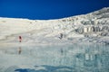 Family in white calcium Pamukkale travertines