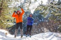 Family in winter forest Royalty Free Stock Photo