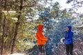 Family in winter forest Royalty Free Stock Photo