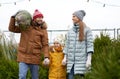 Happy family buying christmas tree at market Royalty Free Stock Photo