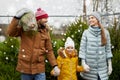 Happy family buying christmas tree at market Royalty Free Stock Photo