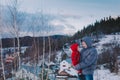 Family on winter mountain background