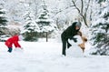 Family in winter park Royalty Free Stock Photo