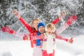 Family in winter park Royalty Free Stock Photo