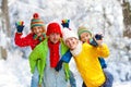 Family in winter park. Snow fun with kids Royalty Free Stock Photo