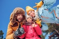 Winter vacation. Family time together outdoors showing thumbs up cheerful bottom view Royalty Free Stock Photo