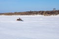 Family winter walks on a snowmobile in nature Royalty Free Stock Photo