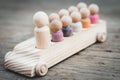 Family of Wooden Peg People in Car Royalty Free Stock Photo