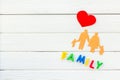 Family word and figure for adopt child concept on white background top view mock up