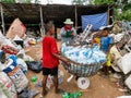 Family working at waste disposal site