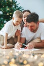 Family writing a letter to Santa Claus Royalty Free Stock Photo