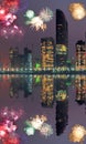 Abu Dhabi with skyscrapers against fireworks in United Arab Emirates