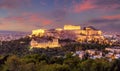 Famous  The Acropolis of Athens, Greece, with the Parthenon Temple with lights during sunset. Athens, Greece, Europe Royalty Free Stock Photo