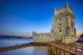 Famous Ancient Belem Tower on Tagus River in Lisbon at Blue Hour in Portugal Royalty Free Stock Photo