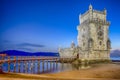 Famous Ancient Belem Tower on Tagus River in Lisbon at Blue Hour in Portugal Royalty Free Stock Photo