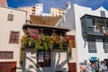 Famous ancient colorful balconies decorated with flowers. Santa Cruz - capital city of the island of La Palma, Canary Islands,