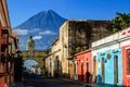 Famous arch and volcano view, Antigua, Guatemala Royalty Free Stock Photo