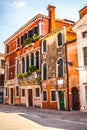 Famous architectural monuments and colorful facades of old medieval buildings close-up n Venice, Italy. Royalty Free Stock Photo