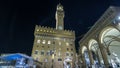 Famous Arnolfo tower of Palazzo Vecchio timelapse on the Piazza della Signoria at twilight in Florence, Tuscany, Italy Royalty Free Stock Photo